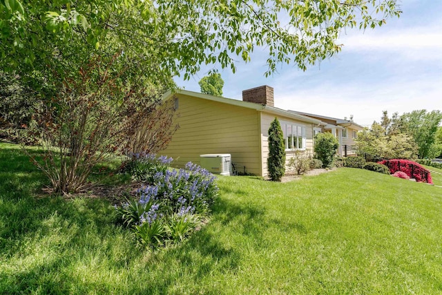 1348 Anderson Ave, Morgantown, WV 26505 - view of property exterior featuring a chimney and a lawn