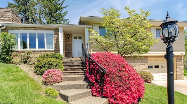 1348 Anderson Ave, Morgantown, WV 26505 - view of front of house with concrete driveway and stone siding
