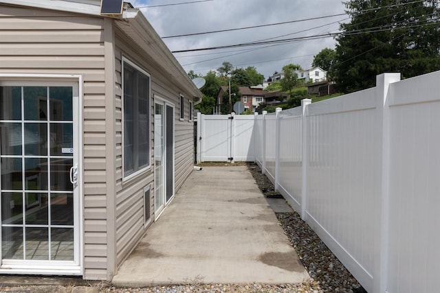 42 Crummitt Ln, Clarksburg, WV 26301 - fenced backyard featuring a gate and a patio