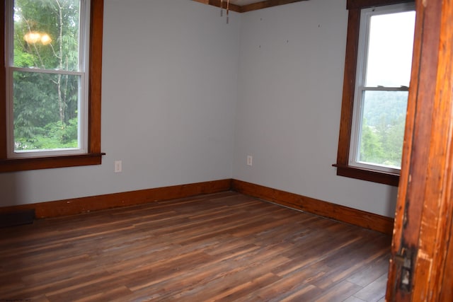 132 Racine St, Morgantown, WV 26505 - spare room featuring dark wood-style floors and baseboards