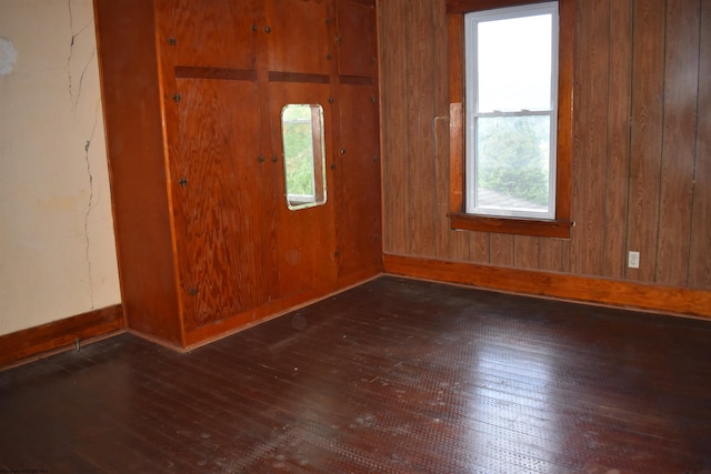 132 Racine St, Morgantown, WV 26505 - spare room with wood-type flooring and wood walls