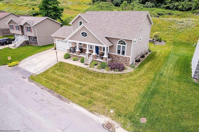 117 Summits Rdg, Morgantown, WV 26508 - view of front of home with a porch, stone siding, driveway, a front lawn, and a garage