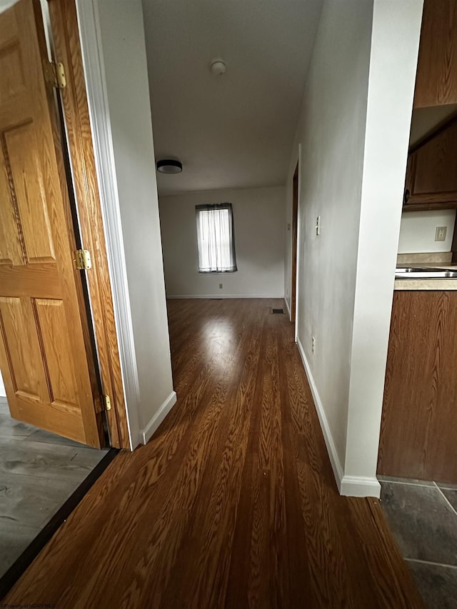 1218 N 18th St, Clarksburg, WV 26301 - hallway featuring dark wood-style flooring and baseboards