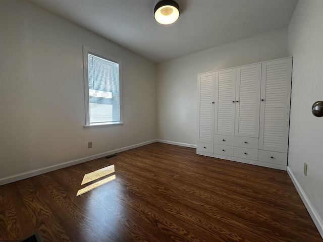 1218 N 18th St, Clarksburg, WV 26301 - unfurnished bedroom with wood finished floors and baseboards