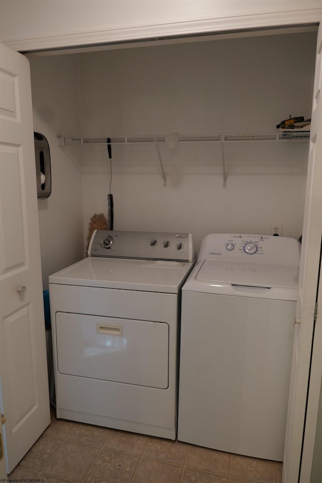 6 Sorrel Ct, Terra Alta, WV 26764 - washroom with washing machine and clothes dryer and light tile patterned floors