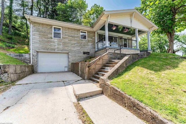 552 White Ave, Morgantown, WV 26501 - view of front of property featuring stone siding, an attached garage, a front yard, and concrete driveway