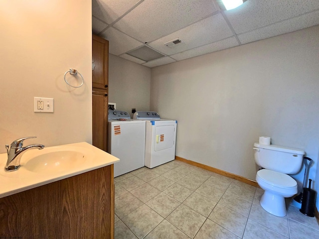 118 June Ln, Morgantown, WV 26508 - bathroom featuring a paneled ceiling, washing machine and dryer, tile patterned floors, and vanity