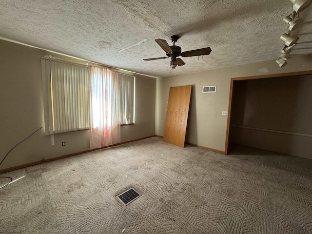 113 Buckhannon Ave, Clarksburg, WV 26301 - spare room with ceiling fan, carpet, and a textured ceiling