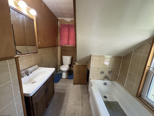 113 Buckhannon Ave, Clarksburg, WV 26301 - full bathroom featuring tile walls, vanity, a garden tub, and a wainscoted wall