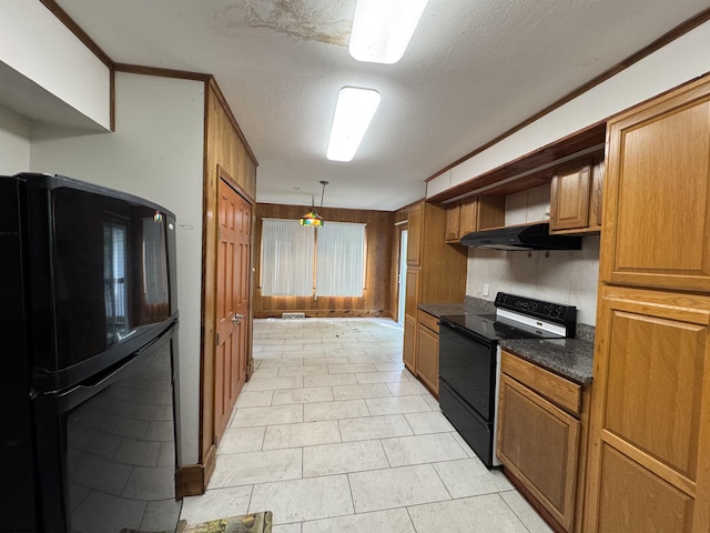 113 Buckhannon Ave, Clarksburg, WV 26301 - kitchen with black appliances, dark countertops, under cabinet range hood, brown cabinets, and a textured ceiling