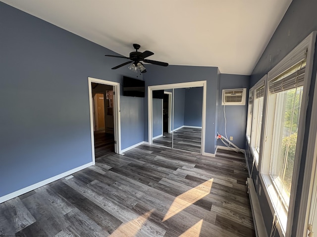 1998 Lake Floyd Cir, Bristol, WV 26426 - unfurnished bedroom with dark wood-type flooring, lofted ceiling, a closet, an AC wall unit, and ceiling fan