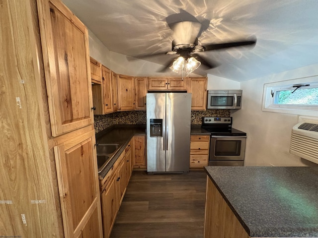 1998 Lake Floyd Cir, Bristol, WV 26426 - kitchen with appliances with stainless steel finishes, dark countertops, dark wood finished floors, and tasteful backsplash