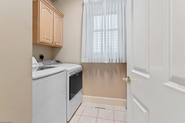 901 Suncrest Pl, Morgantown, WV 26505 - laundry room with cabinet space, independent washer and dryer, and light tile patterned floors