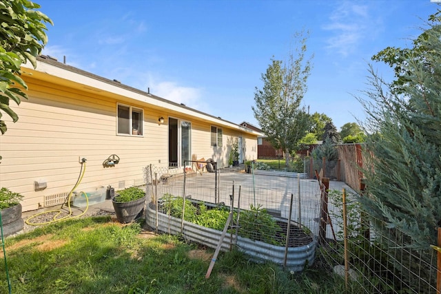 rear view of house featuring a patio