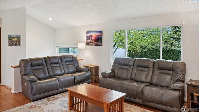 863 S Meadowlark Ln, Othello, WA 99344 - living area featuring wood finished floors and lofted ceiling