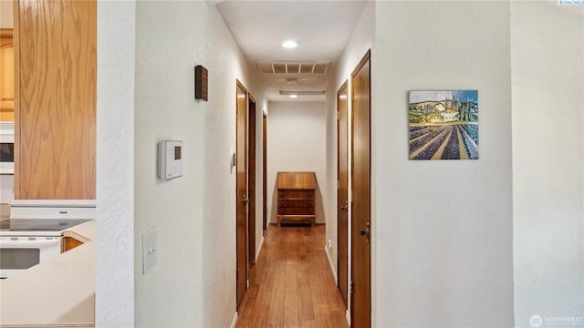863 S Meadowlark Ln, Othello, WA 99344 - hallway with light wood finished floors and recessed lighting