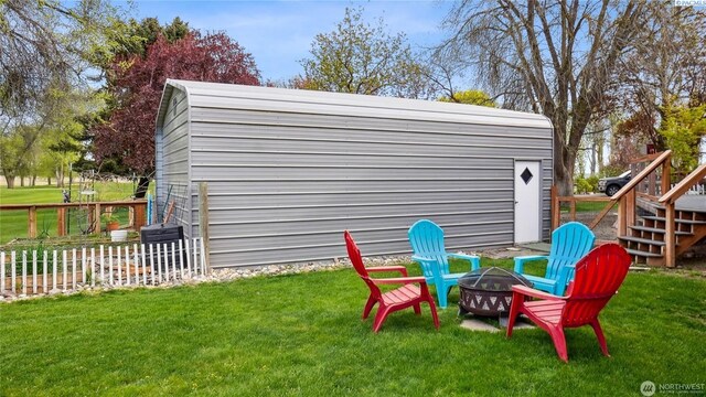 863 S Meadowlark Ln, Othello, WA 99344 - view of yard featuring an outdoor fire pit and stairway