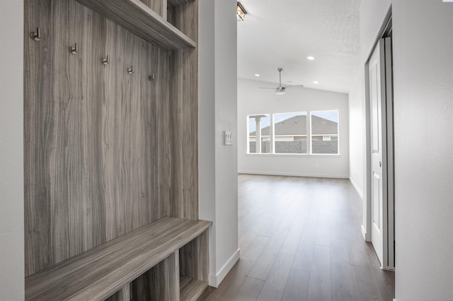 8509 Ashen Dr, Pasco, WA 99301 - mudroom featuring wood finished floors, recessed lighting, ceiling fan, and lofted ceiling