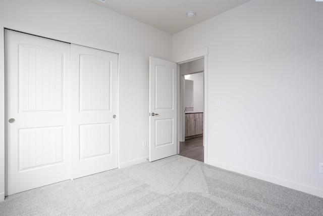 8509 Ashen Dr, Pasco, WA 99301 - unfurnished bedroom featuring carpet and a closet