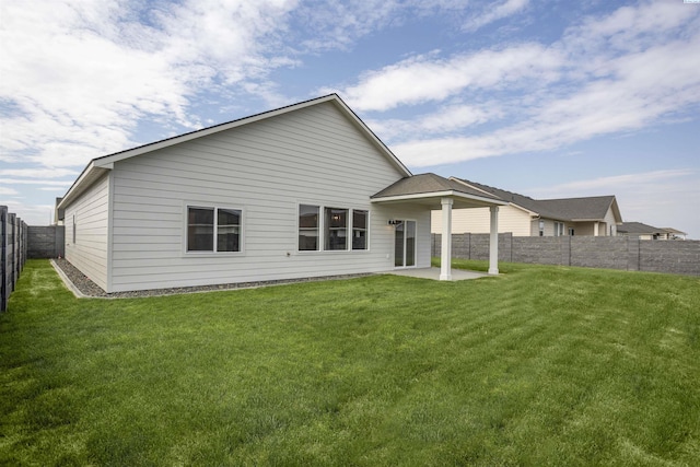 8509 Ashen Dr, Pasco, WA 99301 - back of property featuring a patio and a fenced backyard