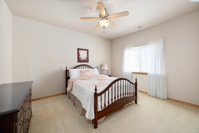 3610 S Johnson St, Kennewick, WA 99337 - bedroom with light colored carpet, baseboards, and ceiling fan