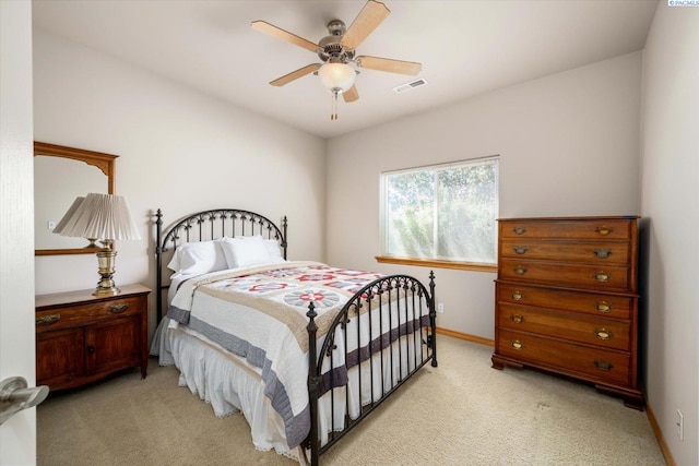 3610 S Johnson St, Kennewick, WA 99337 - bedroom with light carpet, baseboards, and ceiling fan