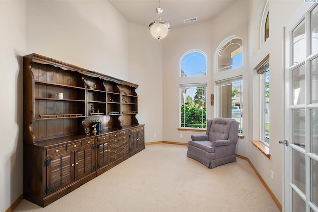3610 S Johnson St, Kennewick, WA 99337 - sitting room with carpet floors, baseboards, a high ceiling, and french doors