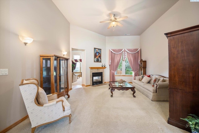 3610 S Johnson St, Kennewick, WA 99337 - carpeted living area with a ceiling fan, a fireplace, and baseboards