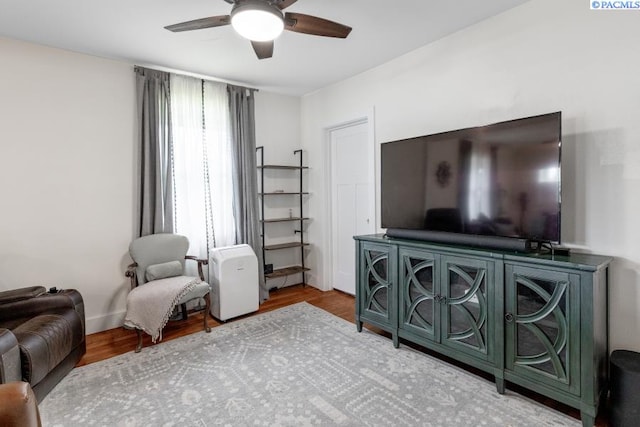 501 W California St, Garfield, WA 99130 - living area featuring ceiling fan and wood finished floors