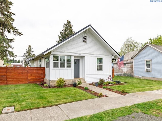 501 W California St, Garfield, WA 99130 - bungalow-style home with board and batten siding and entry steps
