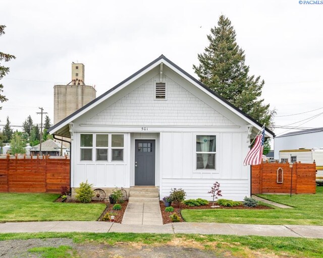 501 W California St, Garfield, WA 99130 - bungalow-style house featuring board and batten siding and a chimney