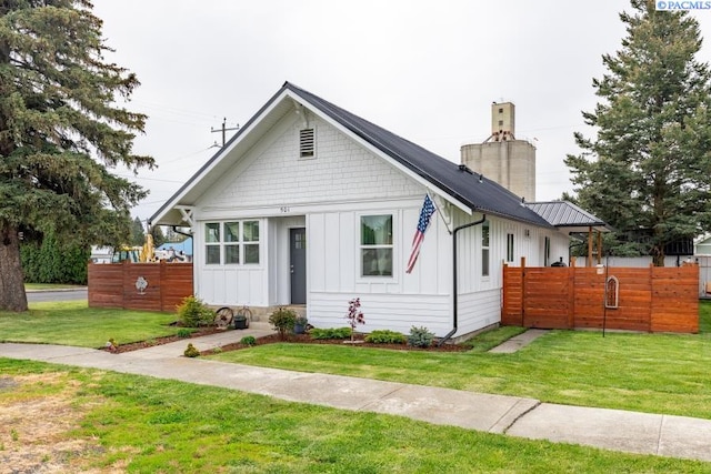 501 W California St, Garfield, WA 99130 - view of front of property with board and batten siding and a chimney