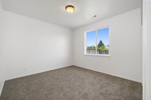 882 Pikes Peak Dr, West Richland, WA 99353 - empty room featuring carpet flooring and baseboards