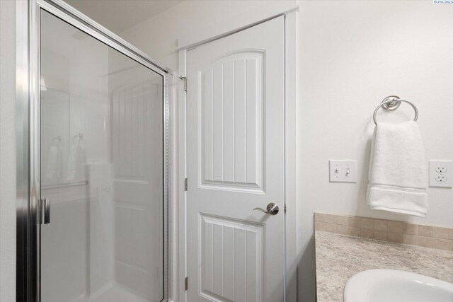 882 Pikes Peak Dr, West Richland, WA 99353 - bathroom with a shower stall and vanity