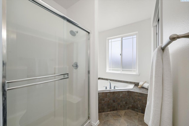 882 Pikes Peak Dr, West Richland, WA 99353 - full bathroom featuring a shower stall, a bath, and tile patterned floors
