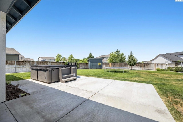 882 Pikes Peak Dr, West Richland, WA 99353 - view of patio with a trampoline