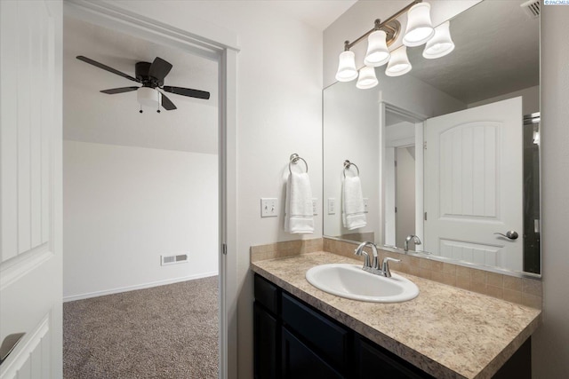 882 Pikes Peak Dr, West Richland, WA 99353 - bathroom featuring vanity and a ceiling fan