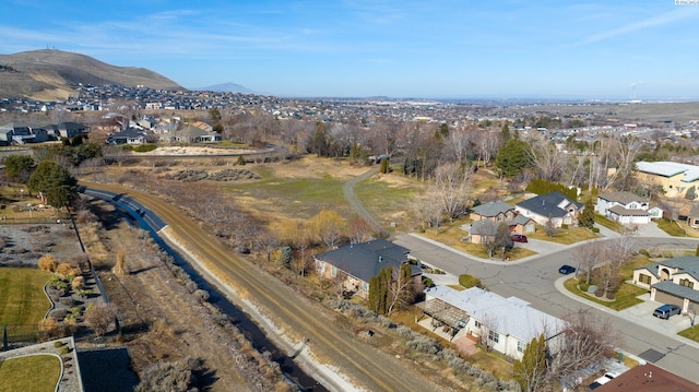 bird's eye view with a residential view and a mountain view