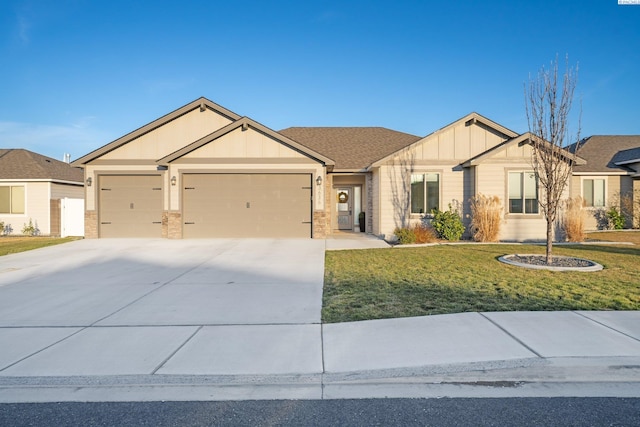 ranch-style home with a garage, concrete driveway, board and batten siding, and a front yard