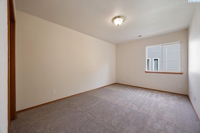3438 S Buntin Ct, Kennewick, WA 99337 - unfurnished room featuring light carpet and baseboards