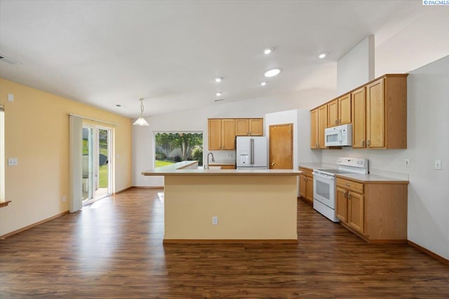 3438 S Buntin Ct, Kennewick, WA 99337 - kitchen with white appliances, dark wood-type flooring, lofted ceiling, light countertops, and a center island with sink