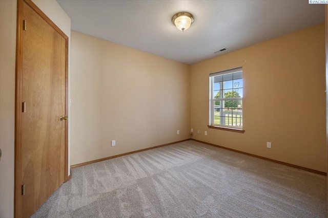 3438 S Buntin Ct, Kennewick, WA 99337 - unfurnished bedroom featuring light colored carpet and baseboards