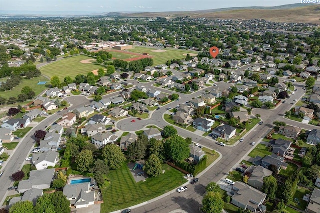 3438 S Buntin Ct, Kennewick, WA 99337 - aerial view of property and surrounding area with nearby suburban area