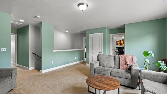 5801 Thistledown Dr, Pasco, WA 99301 - living area with baseboards, light carpet, and recessed lighting