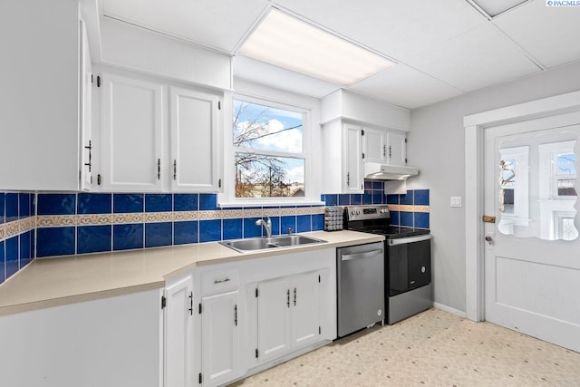 kitchen featuring white cabinetry, stainless steel appliances, sink, and a wealth of natural light