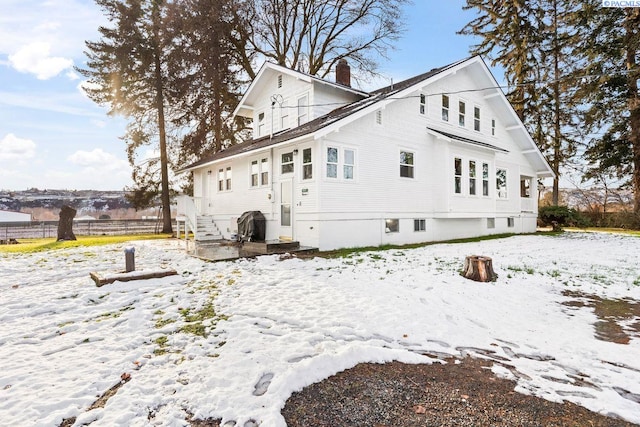 view of snow covered property