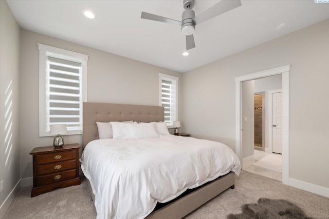 bedroom featuring light carpet, multiple windows, baseboards, and recessed lighting