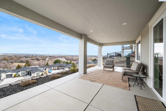 view of patio / terrace featuring a residential view