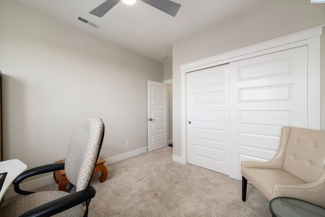 home office featuring carpet floors, baseboards, visible vents, and ceiling fan