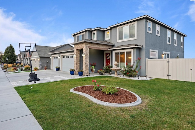 view of front of house with a garage and a front lawn